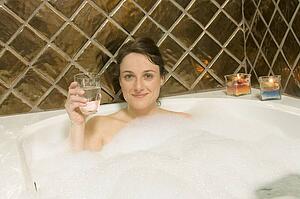Woman having a bubble bath