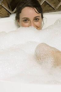 Woman having a bubble bath