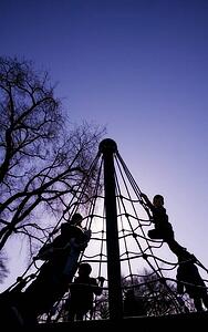 Children climbing in a playground