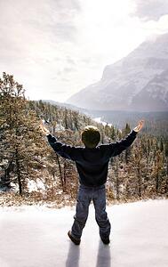 Child with hands raised