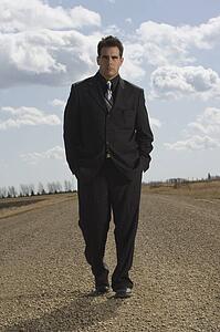 Man walking on road