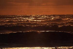 Ocean waves at sunset