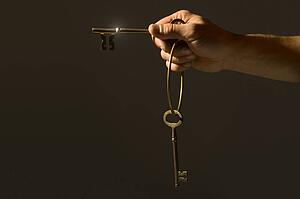 Hand holding keys