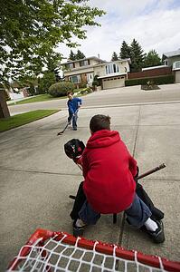 A young goalie anticipates a shot on goal