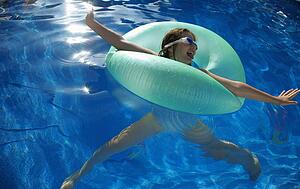 Young girl playing in water