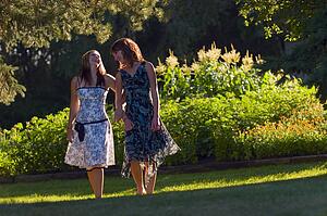 Young women strolling through the park