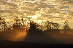 Sunrise through clouds
