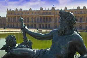 Statues and fountain near Chateau Versailles, France