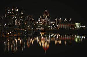 Parliament buildings lit up at night 