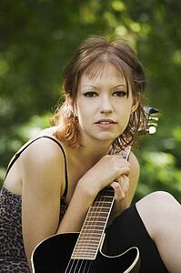 Young woman with guitar
