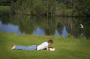 Man reading outside