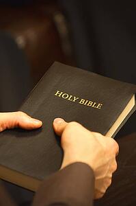 Man holding Bible