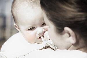 Baby on mother's shoulder