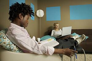 Young man and woman studying