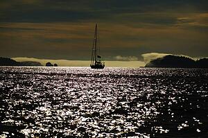 Sailboat on water at dusk