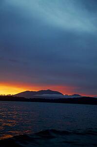 Sunset over mountain lake