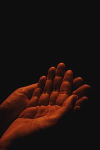 Hands open to receive