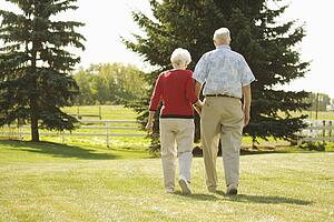 Senior couple walking hand in hand