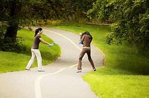 Two women having a water fight