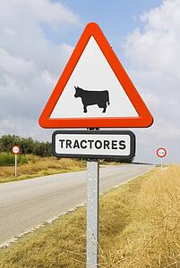 Caution sign in Spanish