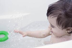 Boy taking a bath