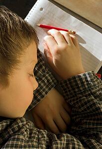 Student asleep on his notebook