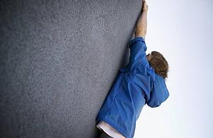 Man hanging on