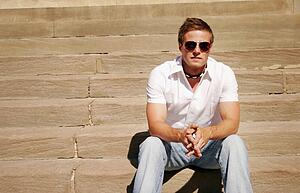 Guy sitting on steps