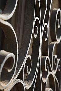 Close-up of wrought iron scrolls in Venice, Italy.