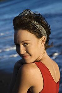 Young adult female Caucasian portrait on beach.