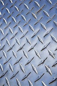 Close-up of diamond plate metal texture.