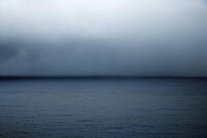 Horizon of cloudy sky over the Pacific Ocean in Maui, Hawaii, USA.