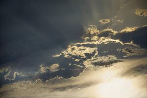 Sun shining through clouds.
