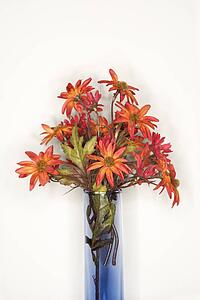 Still life shot of fake flowers in a vase.