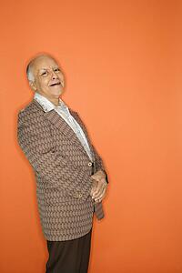 Caucasian adult mature male in retro suit.