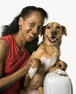 African American prime adult female with dog.