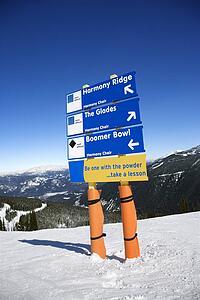 Ski resort trail direction signs.