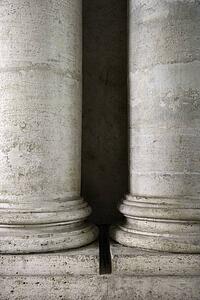 Close-up of two columns at the Roman Forum in Rome, Italy.