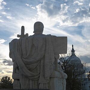 Back view of Authority of Law sculpture in front of Supreme Court building with in Washington D. C.