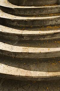 Steps sprinkled with yellow petals in Lisbon, Portugal.