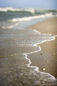 Waves coming onto shore.