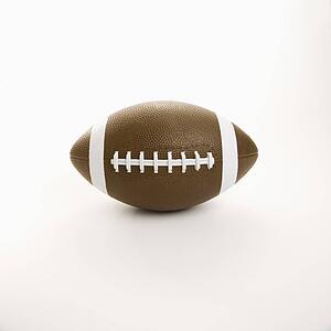 American football on white background.
