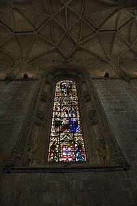 Stained glass window inside Mosteiro dos Jeronimos in Lisbon, Portugal.