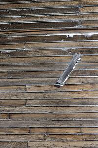 Close up of side of rustic wooden building