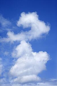 Cloud formation in blue sky.