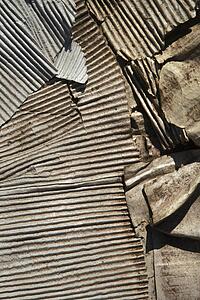 Old twisted corrugated metal.
