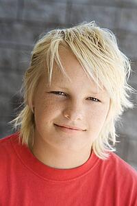 Head shot of Caucasian teen boy looking at viewer.