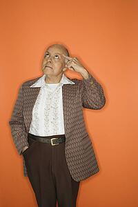 Caucasian adult mature male in retro suit.