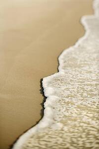 Sandy beach with waves.