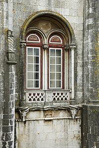 Exterior view of building windows in Lisbon, Portugal.